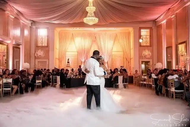A couple dancing in a ballroom at The Heights Villa